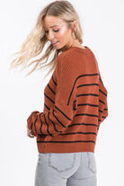 Fall Vibes Rust and Black Striped Sweater with Zigzag ribbed knit pattern.
Color: Rust
Super soft casual and slightly oversized for a slouchy fit with a shorter length.