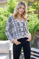 Casual Business Taupe and Black Plaid Cardigan. Shorter length and roomy fit with button up front, medium weight.