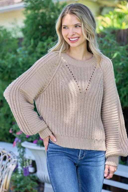 Warm up with this cozy Taupe Chevron Textured Sweater.

Roomy Fit with Bubble Sleeve and Out seam detail on the armhole. Size down one for a more fitted look.